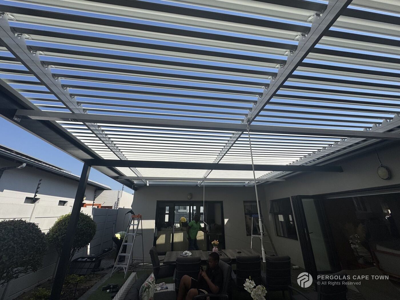 Charcoal frame white louvre roof blouberg