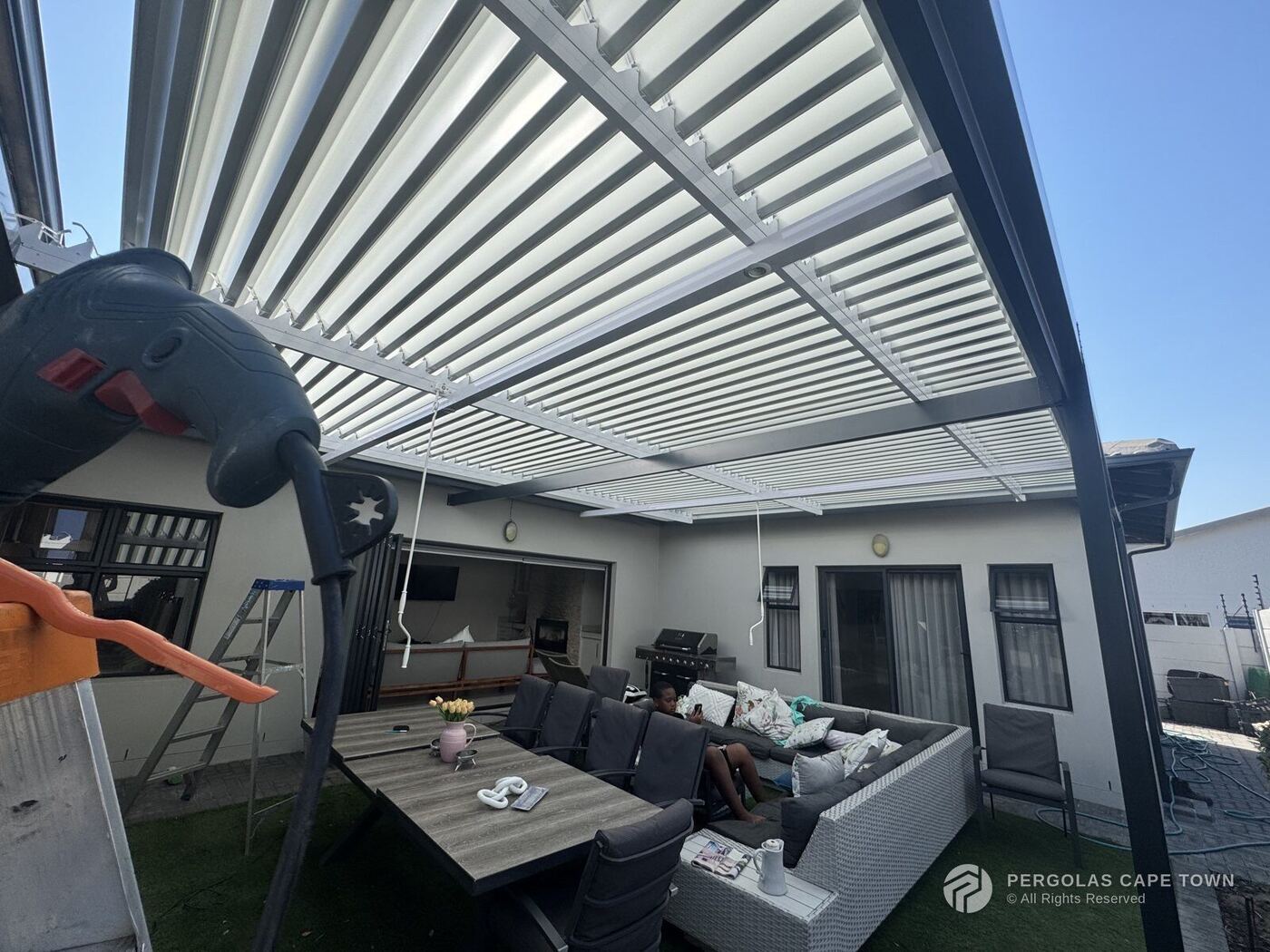 Charcoal frame white louvre roof blouberg