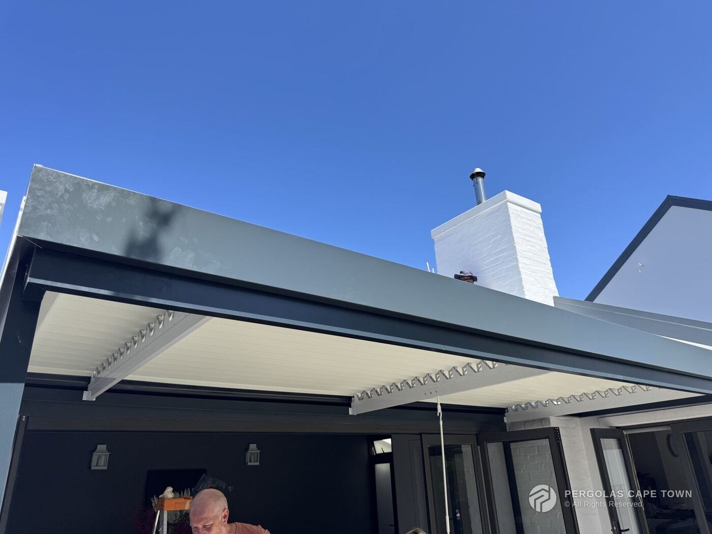 Charcoal frame white louvre roof claremont
