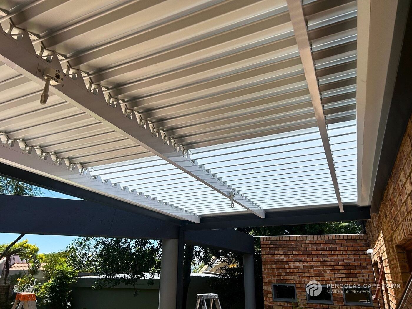 Charcoal frame white louvres manual louvre awning