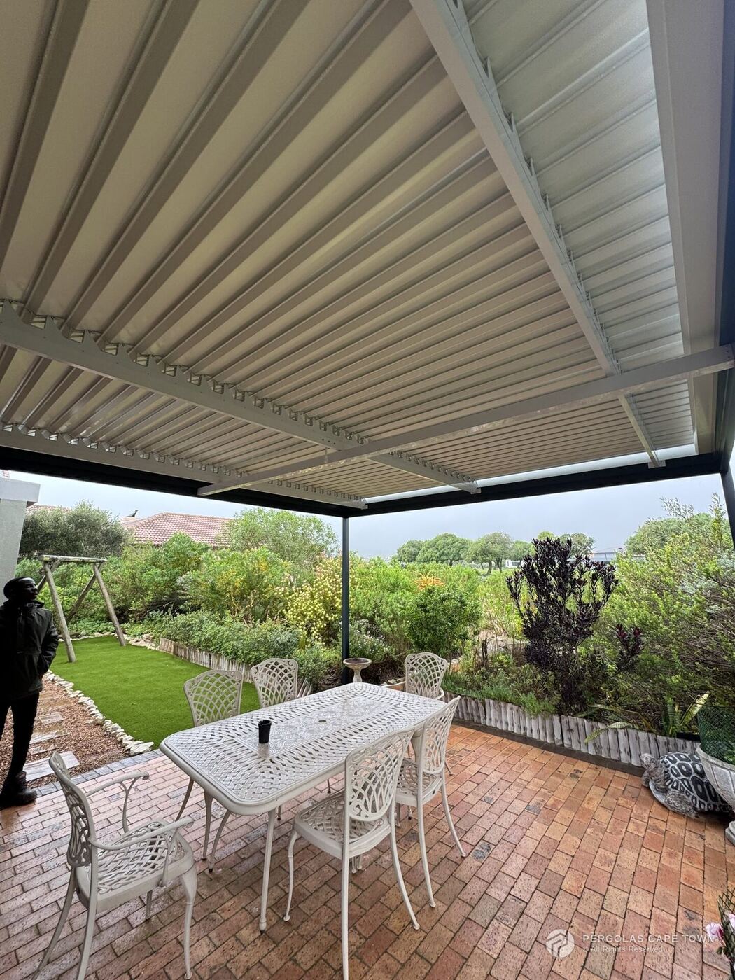 Charcoal white louvre roof west coast