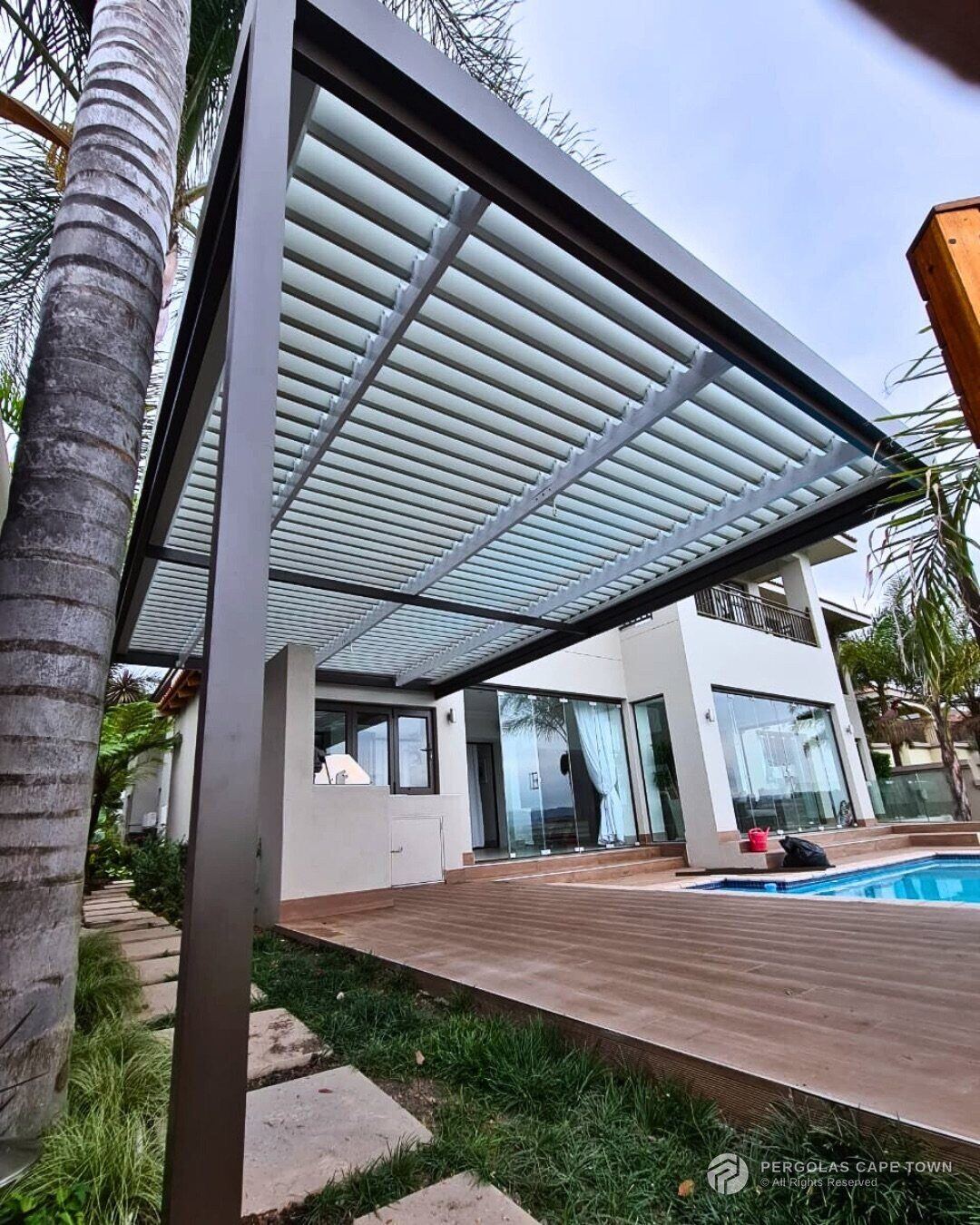Manual adjustable pergola bronze frame white louvres