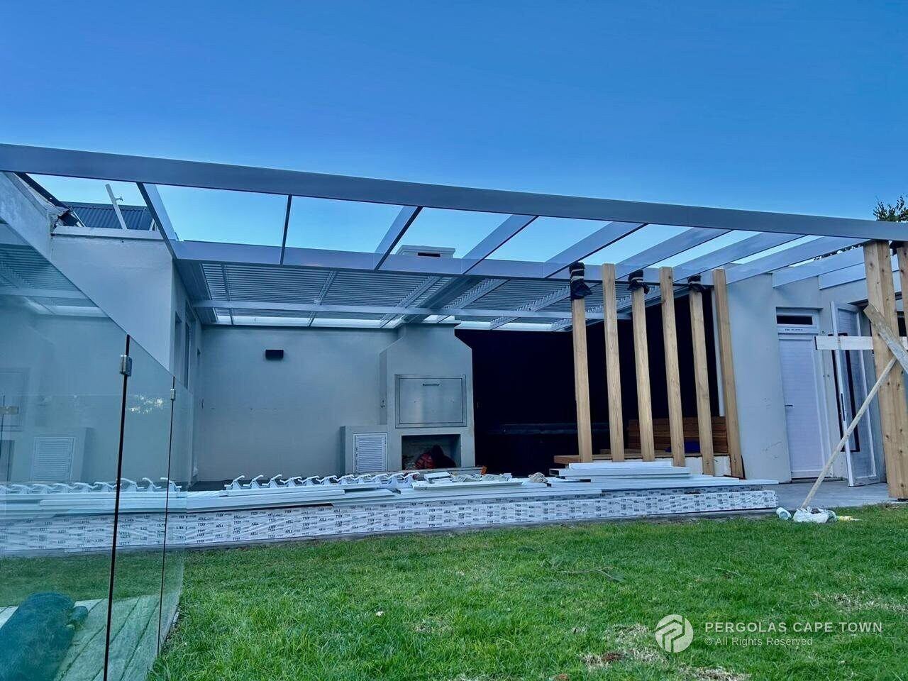 White aluminium louvre awning roof with from extruded pergola