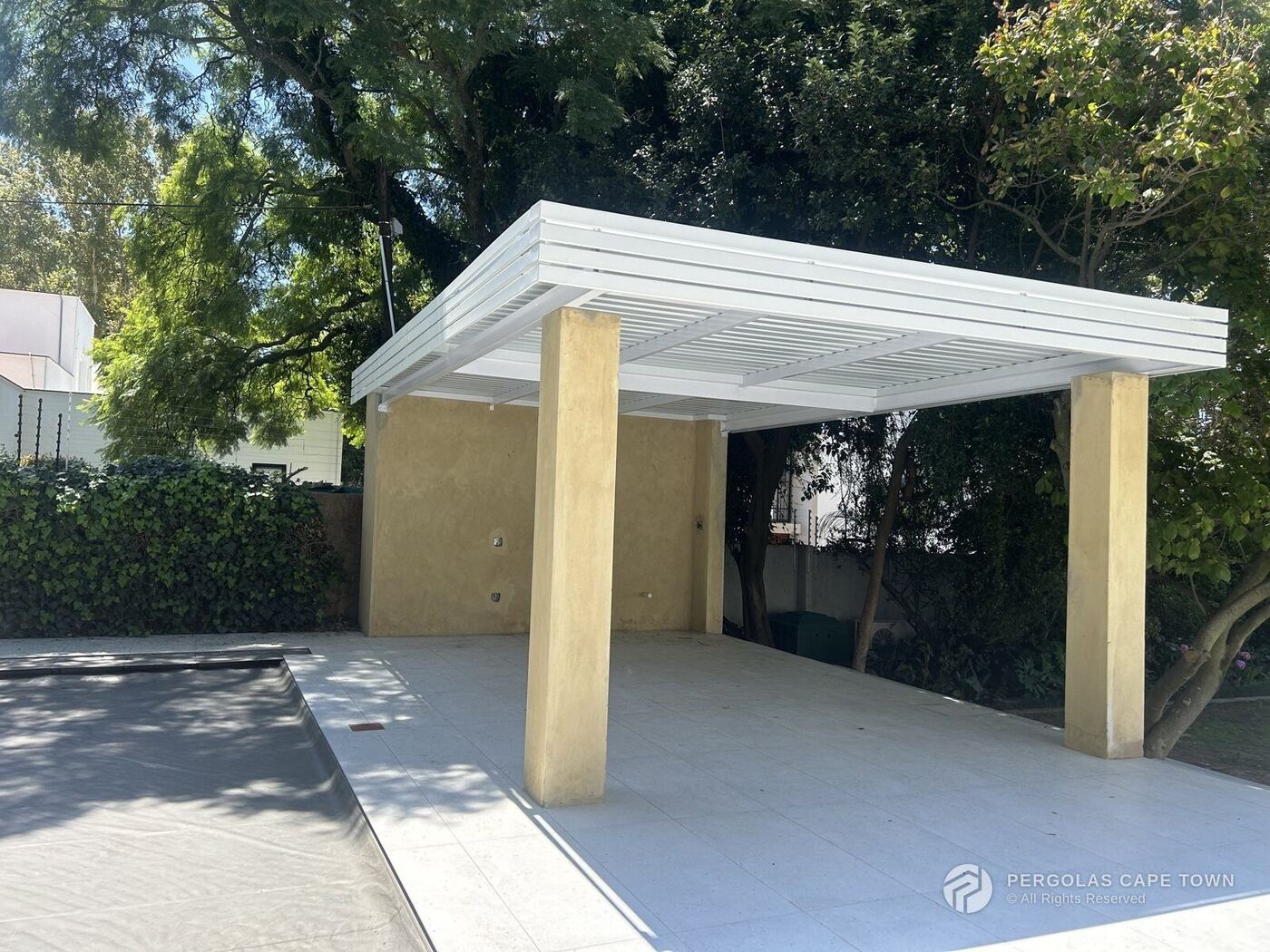 Aluminium fixed IBR awning over a patio