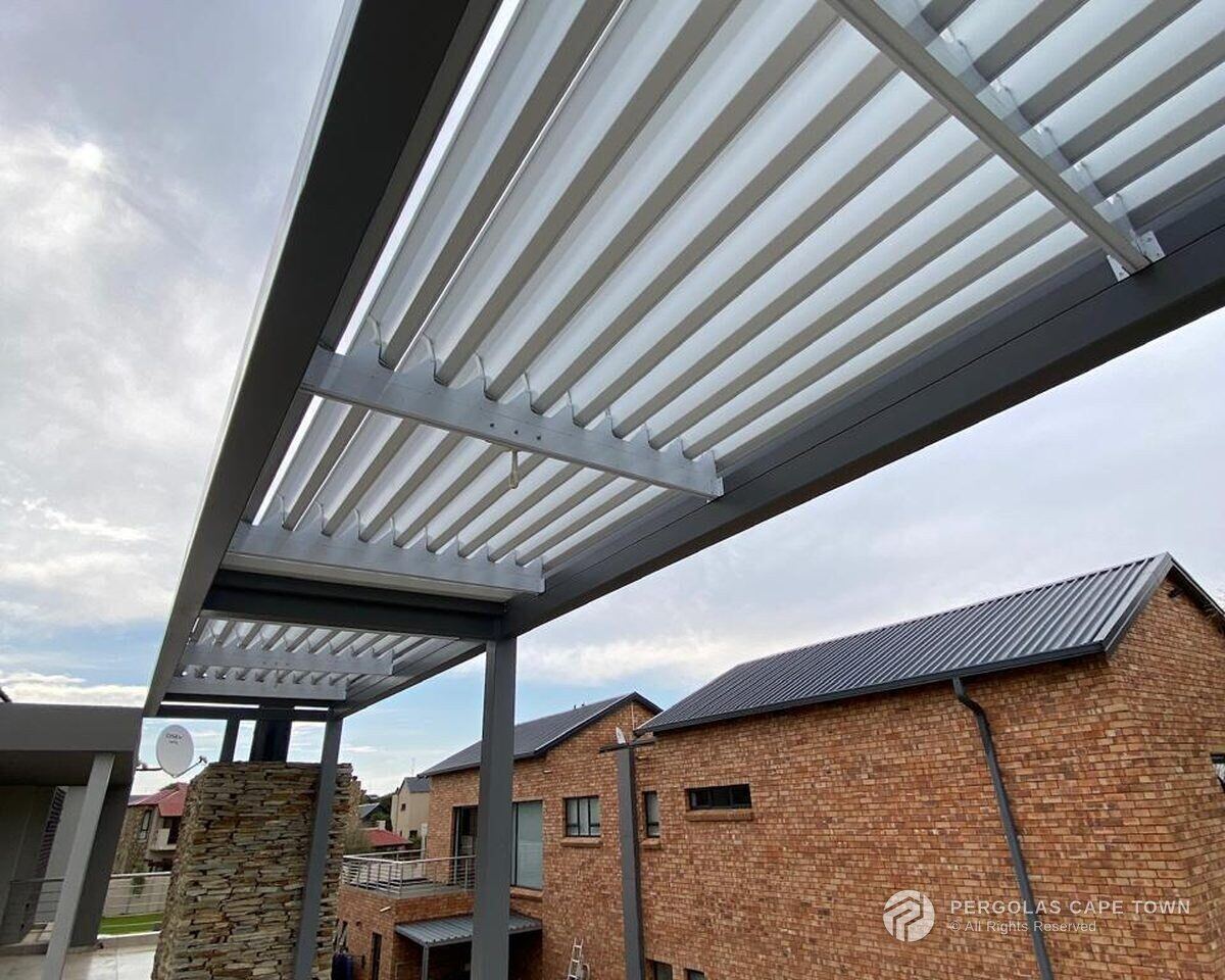 Aluminium louvre roof over a patio